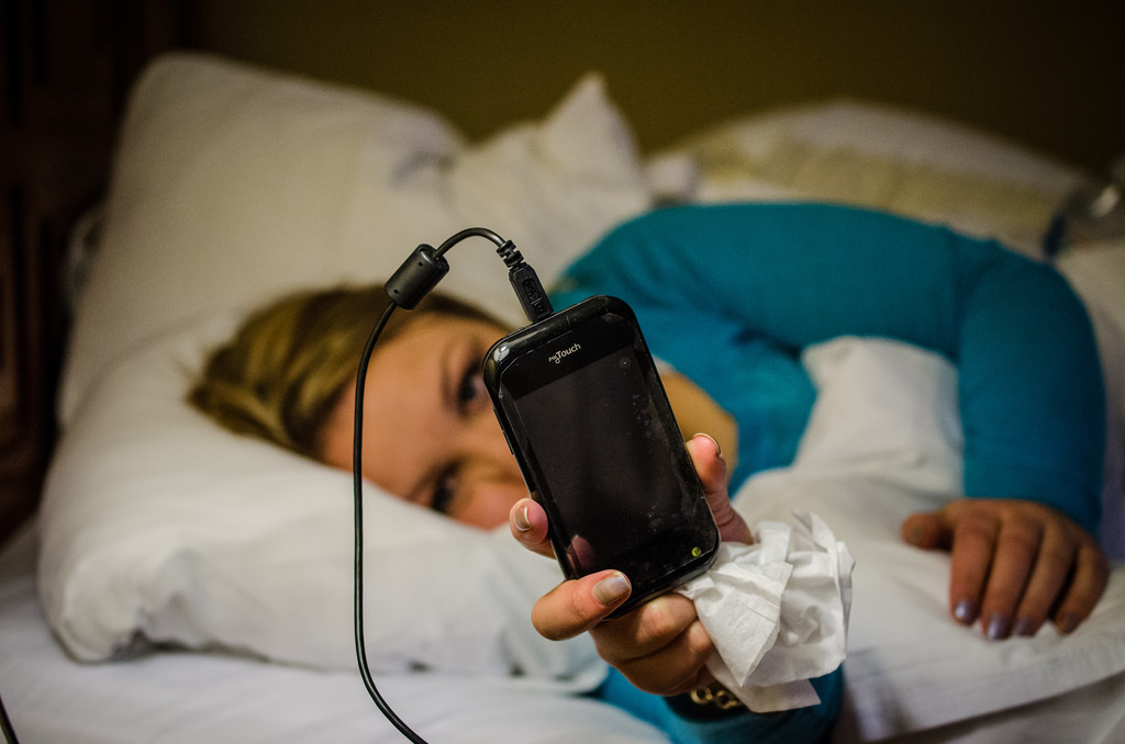 Most of the time, the last thing we do before bed is plugged our smartphones so they're fully charged in the morning. But tech experts have now warned that this habit might be damaging your phone. Some say you should let batteries drain zero before juicing them up. Others claim you should recharge it when it's at about 50 percent to make it last longer. But a recent report appears to how batteries, similarly to most cars, depreciate from the moment of first use. So if you keep your phone plugged in overnight, you're increasing the time it is hooked up to a power supply and chipping away at its long-term battery capacity faster than if you only charged it for a couple of hours. If you think about it, charging your phone while you’re sleeping results in the phone being on the charger for 3-4 months a year, so even though the manufacturers try their best to cover this scenario, this process inevitably lowers the capacity of your phone’s battery. When you buy a smartphone you're more likely to spot battery drain about two years after buying your gadget. But you can counter it by making small changes to your charging habits. Wait until you get to about 35 percent or 40 percent battery before juicing it up to preserve it in the long run. Keeping it cool will help, so remove its case. One expert said that if you must charge overnight, you should consider placing your phone on a saucer while you snooze. Placing your phone under your pillow is a fire hazard, but propping it on a non-flammable surface should keep you safe. And since batteries are technically in constant decay from the moment they are put to use. Apparently, the more time your battery spends plugged into a charger, the capacity it has to hold a quality charge gets lower and lower. So, what’s the right way to charge your phone? Charge more frequently for less time. Instead of plugging it in overnight, charge it before you go to sleep and when you wake up. Don’t wait until your phone gets to “low battery”. Instead, consider the 30-40% range your new “red zone” and charge up when your battery hits this percentage. That will help preserve the capacity of your battery.